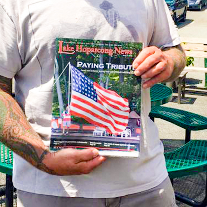 Man holding an issue of 